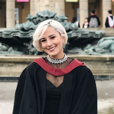 law student Anamaria Fonseca in graduation gown